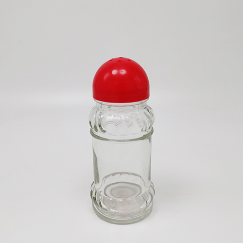 Cylindrical pattern glass bottle with oval red plastic lid for black pepper powder